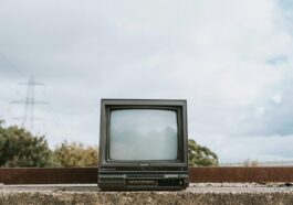 retro tv set placed on stone surface