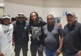 Kundai Benyu with CAPS United officials