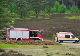 firetruck and an ambulance on the side of the road