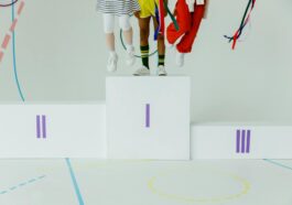 kids standing on a podium