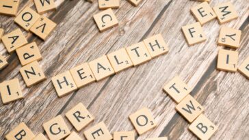 health scrabble letters on a wooden table